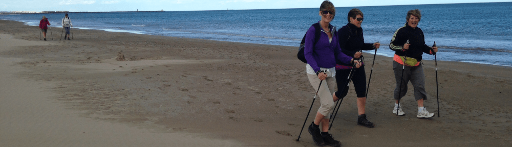 Nordic walking on beach